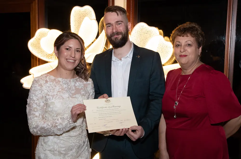 Josie with a wedding couple