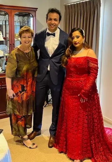 Josie with a bride and groom