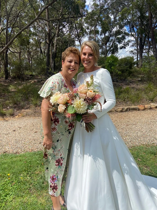 Josie with a bride and her bouquet