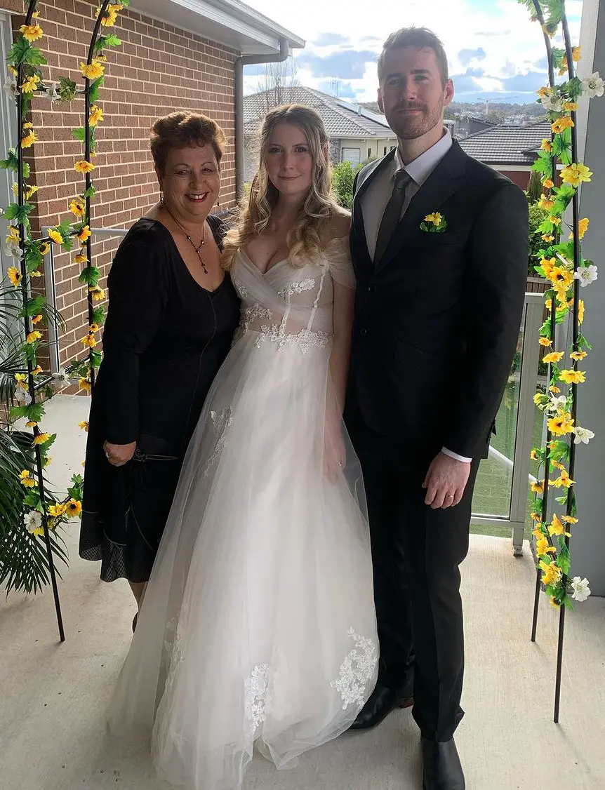 Josie with a bride and groom